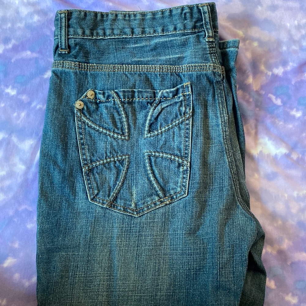Marc Ecko denim bootcut with a cross on the butt.